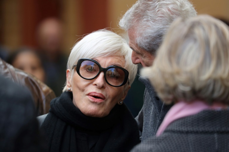 La chanteuse, danseuse et comédienne Nicole Croisille et le réalisateur Claude Lelouch aux funérailles du compositeur Francis Lai, le 14 novembre 2018 à Nice.