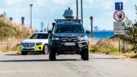 Des véhicules de police près de l'aéroport de Copenhague après un survol de drones, le 23 septembre 2025 au Danemark