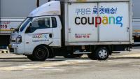 Un camion de livraison du géant sud-coréen du commerce en ligne Coupang, le 9 décembre 2025 à Séoul