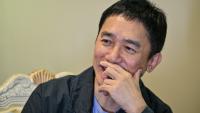 L’acteur hongkongais Tony Leung Chiu-wai s’exprime lors d’une interview avec l’AFP au 28e Festival international du film de Shanghai, à Shanghai, le 19 juin 2026