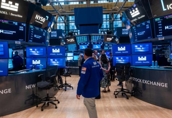 Traders sur le parquet du New York Stock Exchange (NYSE) le 11 juin 2026 à New York