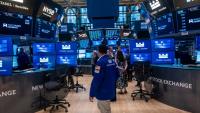 Traders sur le parquet du New York Stock Exchange (NYSE) le 11 juin 2026 à New York