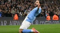 Le milieu Français de Manchester City Rayan Cherki célèbre son but mercredi soir en Ligue des champions, le quatrième de son équipe contre Dortmund.