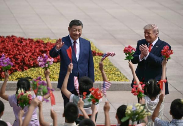 Les présidents chinois Xi Jinping et américain Donald Trump, le 14 mai 2026 à Pékin