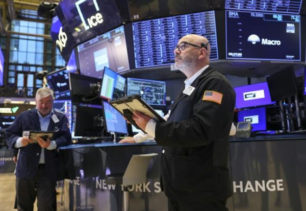 Des opérateurs à la Bourse de New York, le 24 mars 2026