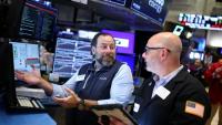 Des opérateurs à la Bourse de New York le 13 avril 2026