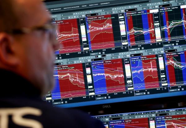 Un trader travaille à la Bourse de New York, le 14 janvier 2026