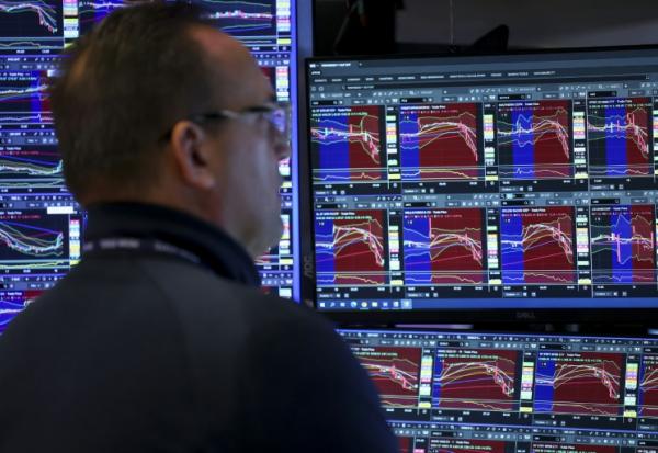 Un opérateur à la Bourse de New York, le 18 mars 2026