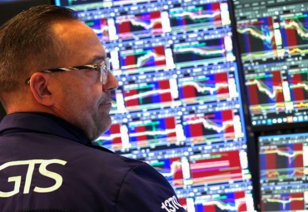 Un opérateur à la Bourse de New York, le 13 octobre 2025