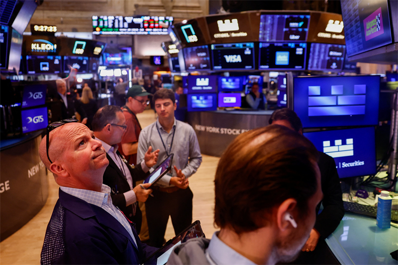 Wall Street dans le vert avec les résultats bancaires et les bons chiffres de l'inflation